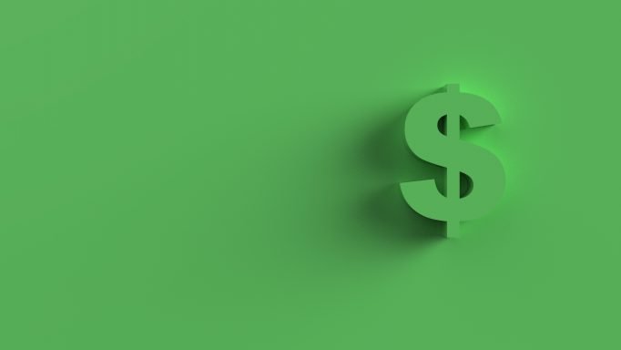 Green dollar sign on green background representing cost-effective heating solutions