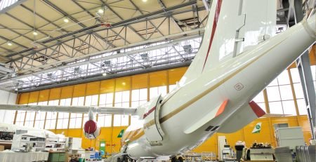 InfraSchwank overhead tube heater installed in commercial aircraft hangar