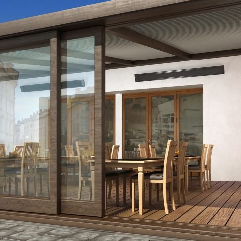 Comfortline infrared heater installed above an outdoor restaurant terrace dining area