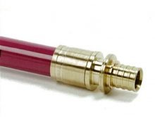 Rehau red hydronic heating pipe with brass push-fit connector