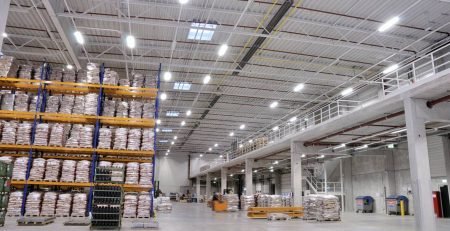Schwank gas radiant tube heaters installed in large distribution centre warehouse ceiling