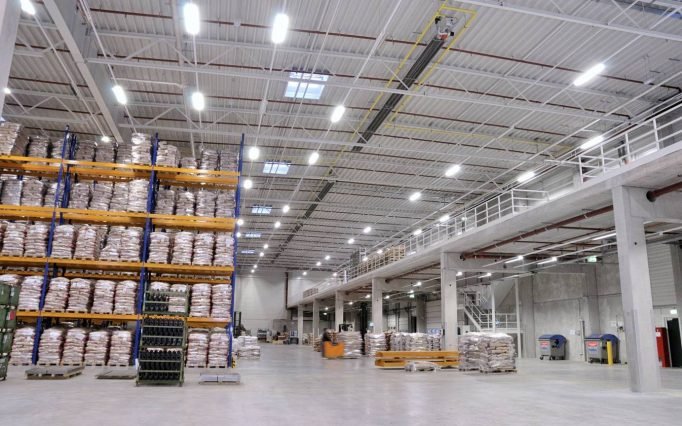 Schwank gas radiant tube heaters installed in large distribution centre warehouse ceiling