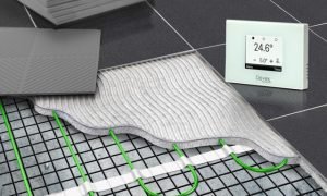 Devex electric underfloor heating mat installed under tile with Xthermostat showing 24.6 degrees