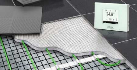 Devex electric underfloor heating mat installed under tile with Xthermostat showing 24.6 degrees