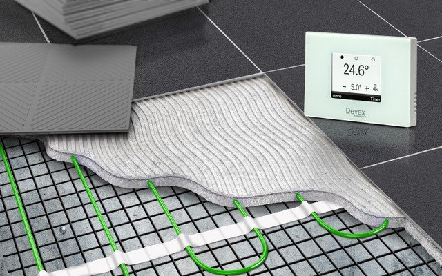 Devex electric underfloor heating mat installed under tile with Xthermostat showing 24.6 degrees